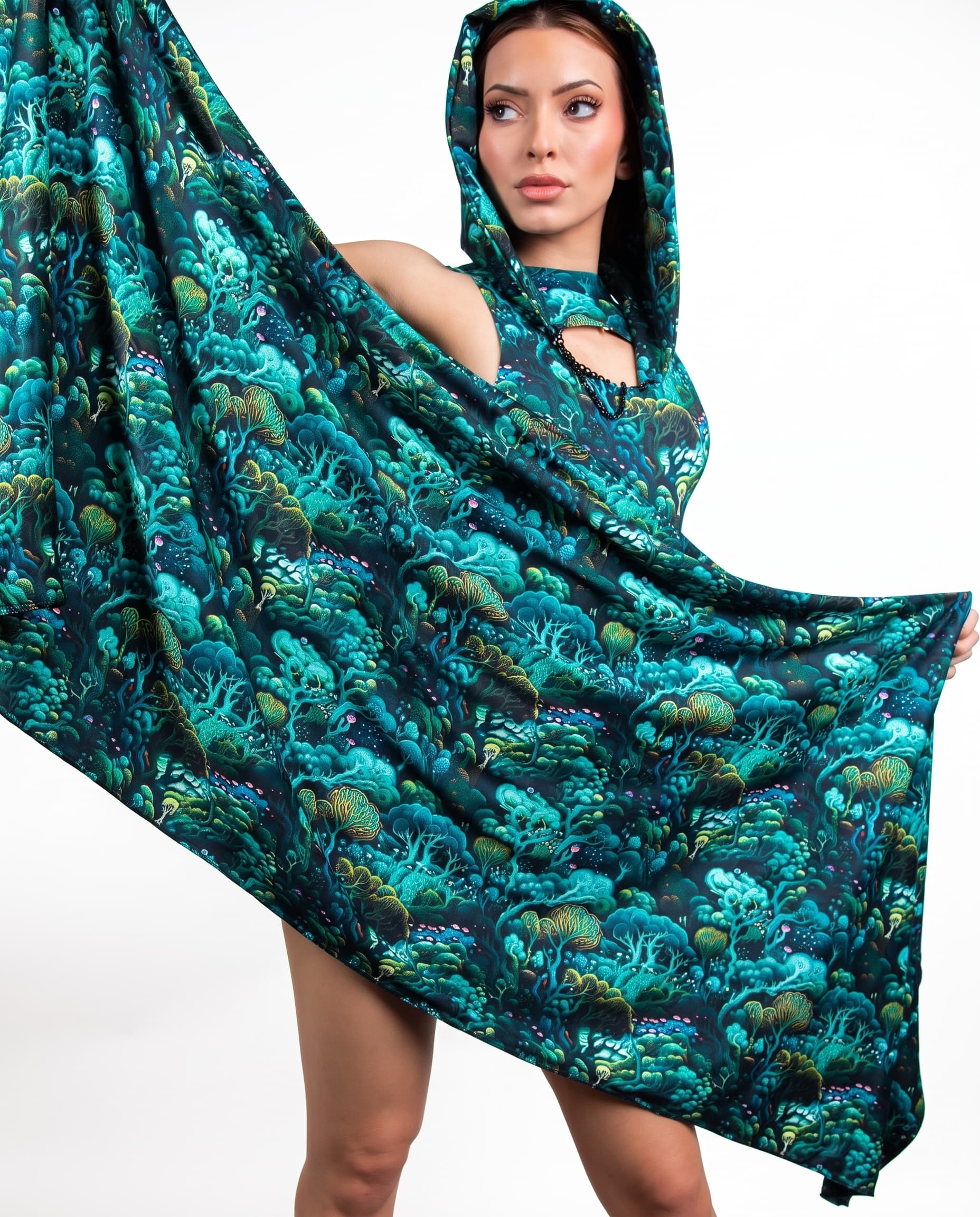 Faewood Festival Scarf, front view with hood up and teal forest print fabric spread across the body